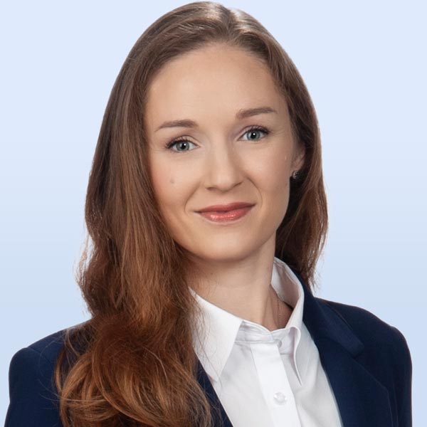 Professional woman in a business suit.